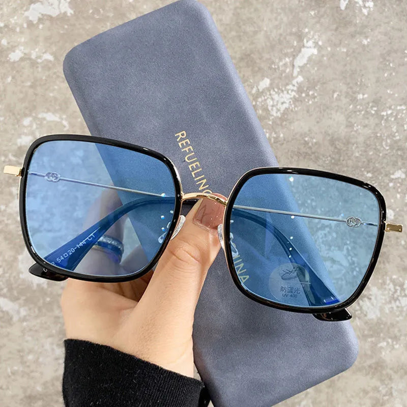 Photochromic myopia glasses with large frame, anti-blue light lens, and Black Gold frame colour options