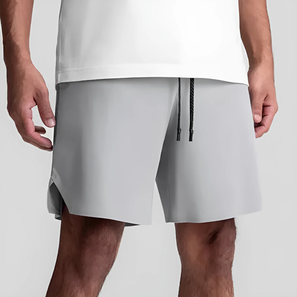 Men's grey seamless sports shorts with knee-length straight-leg design for athletic wear