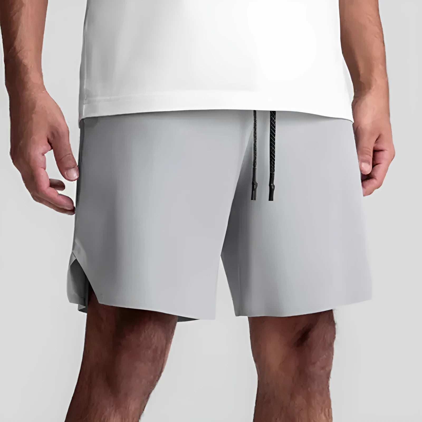 Men's grey seamless sports shorts with knee-length straight-leg design for athletic wear