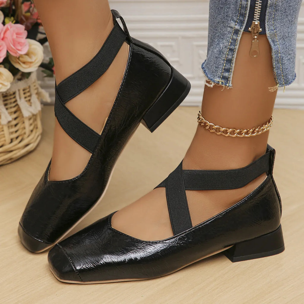 Gold slip-on overshoes with a square toe and low rubber heel, shown as shoe covers.