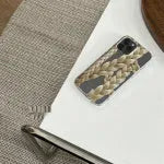 Twist braid transparent TPU phone case for iPhone showing braided edge and clear back