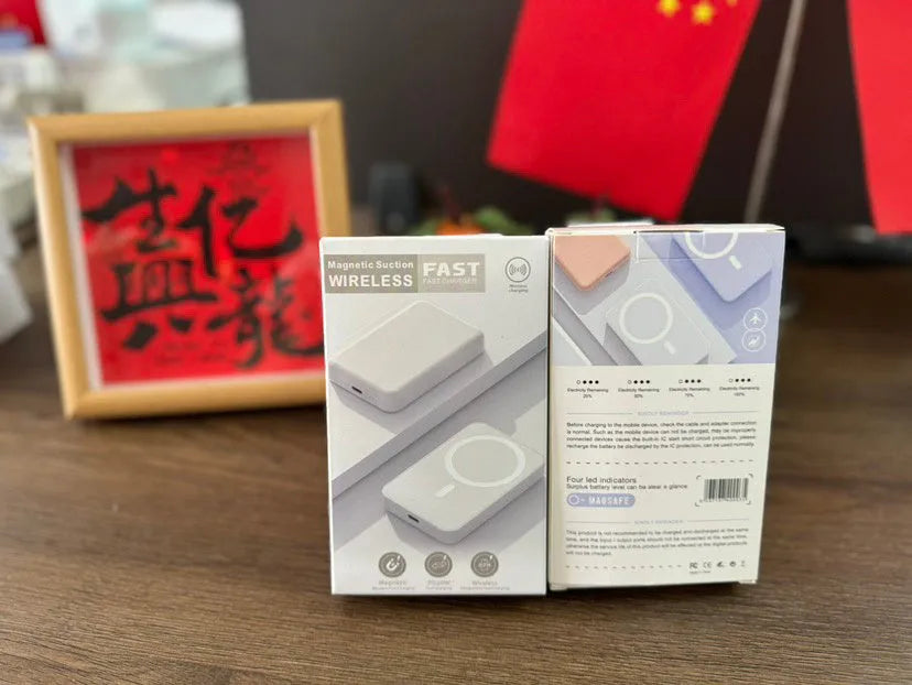 White wireless power bank with magnetic charging surface showing 5000mAh capacity label