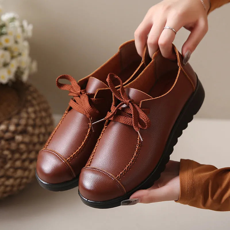 Women's work shoes in colour 6018 Black with round toe, front lacing, and anti-slip sole