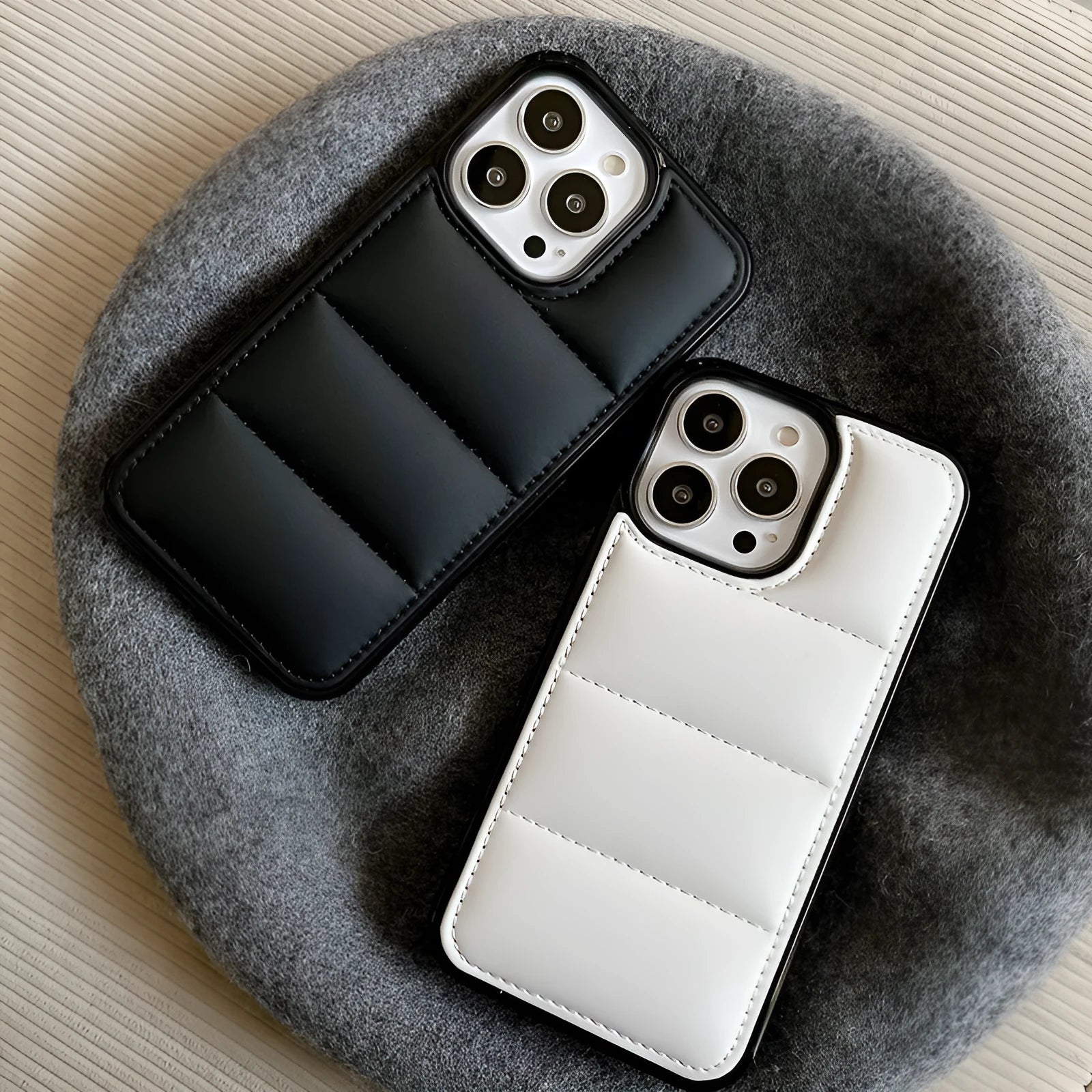 Candy Down Jacket shape phone case for iPhone in black, white, rose red, or green solid colours.