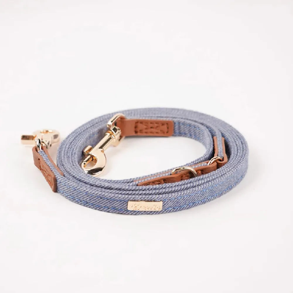 Anti-lost nameplate mohair dog collar in cement gray with matching hand holding rope for Shiba Inu