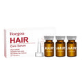 Three small 5ml bottles of nourishing hair root liquid with ginger and rosemary extract.