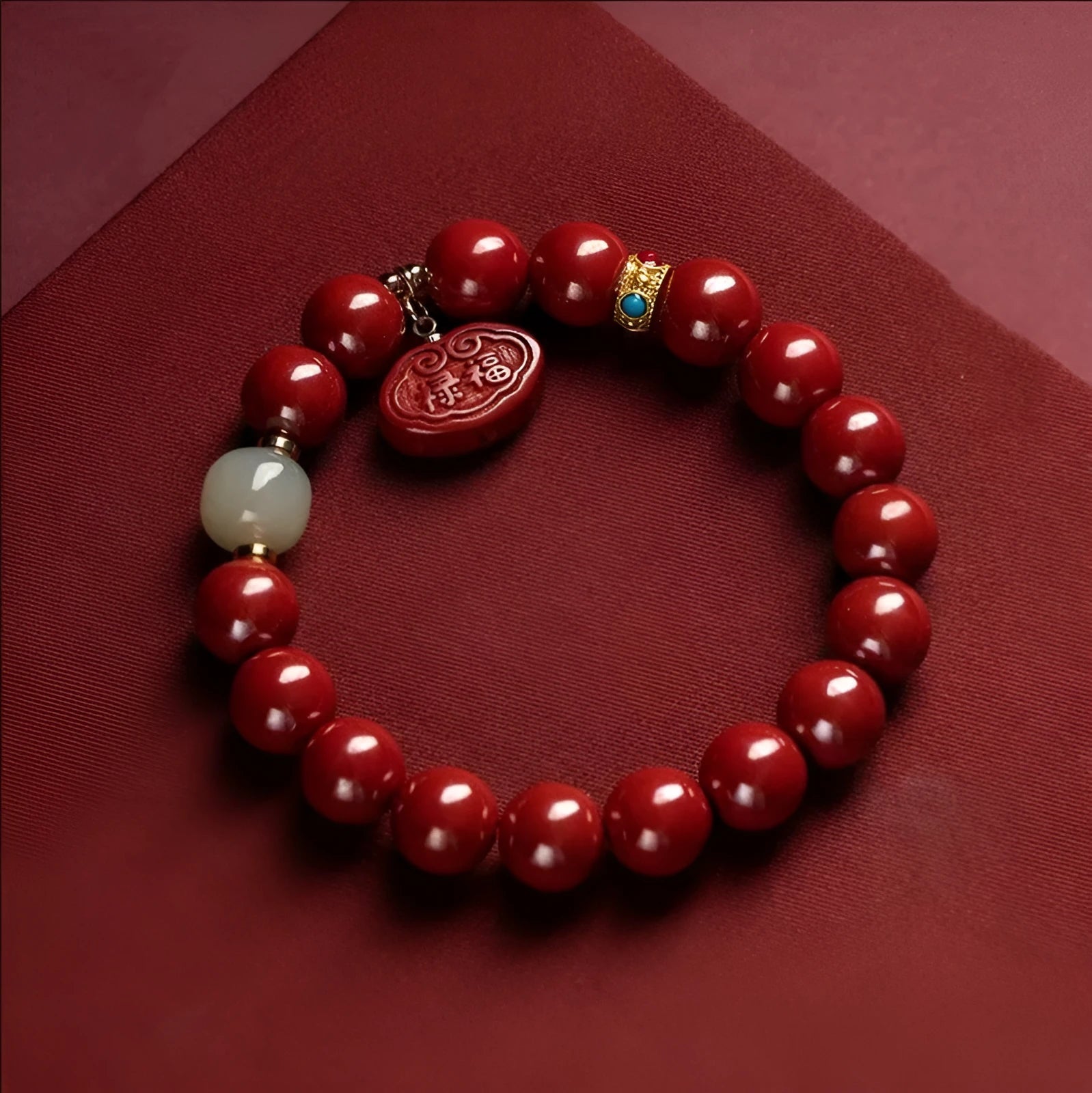 Natural cinnabar Emperor Sandstone bracelet with Ping An Fu Lu design in 8mm or 10mm bead size
