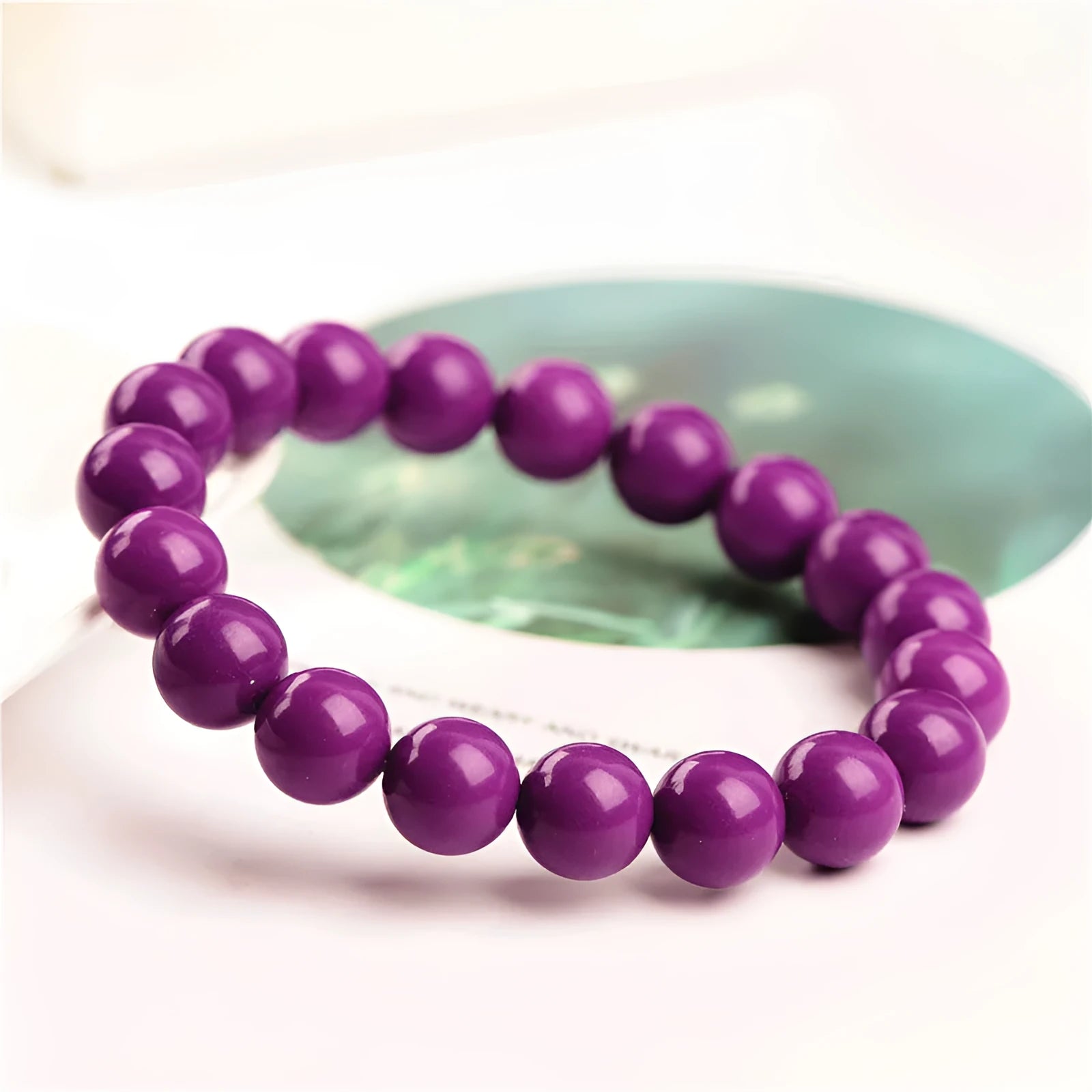 Jiuya polished crystal women's bracelet in 5A colour on a wrist, showing single circle bead design.