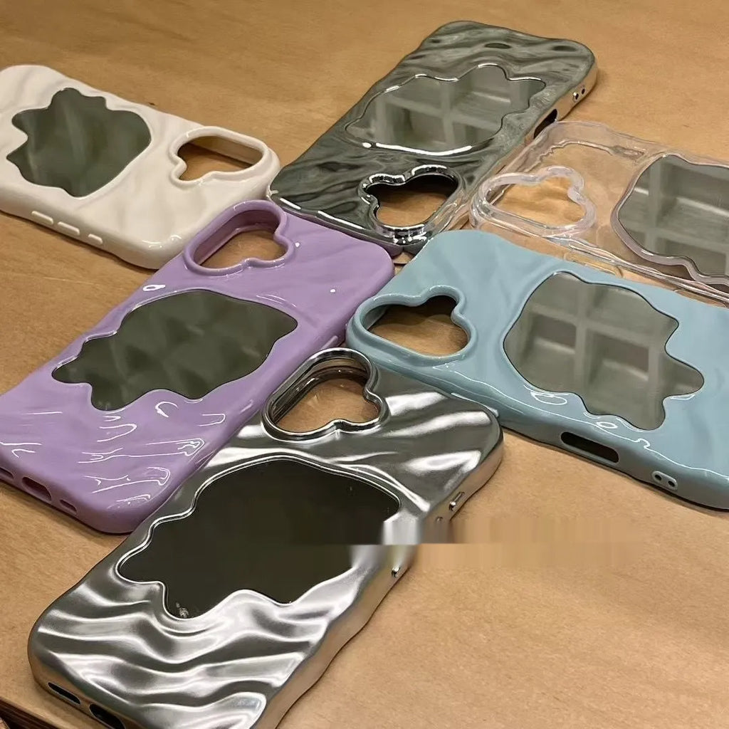 Water ripple texture solid colour mirror phone case for iPhone on a table.