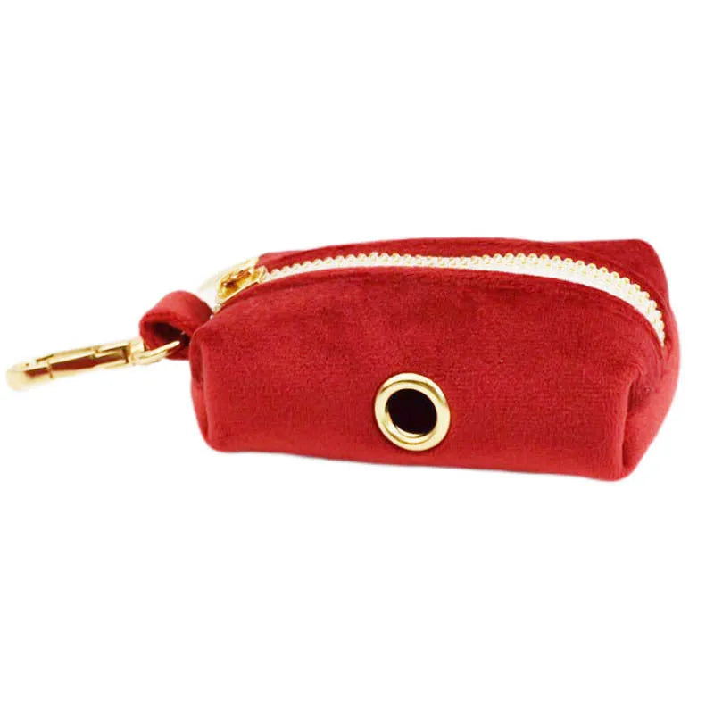 Cloth dog collar and leash set with matching vest, decorative bow, and dog poop bag accessories