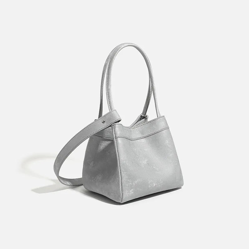 Portable shoulder crossbody bag in black PU leather with open pocket outer and sewing thread detail