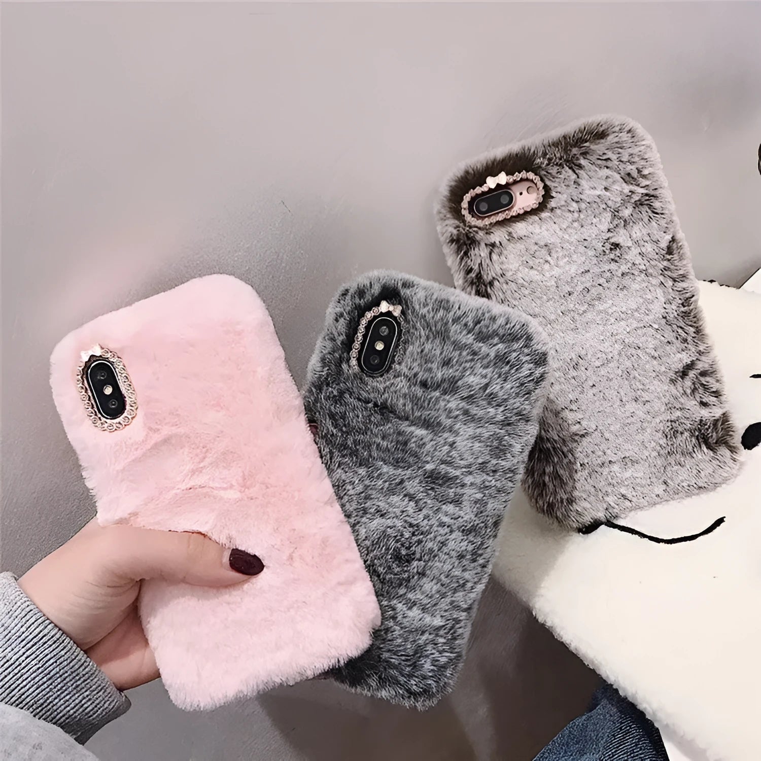 Silicone iPhone back cover case with rhinestones in grey, brown or pink plush shell colour.