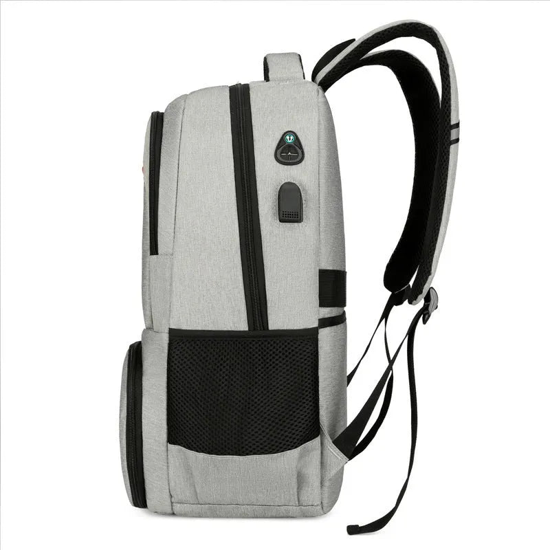 Light grey insulated Oxford cloth backpack with curved shoulder straps and dry wet separation compartments