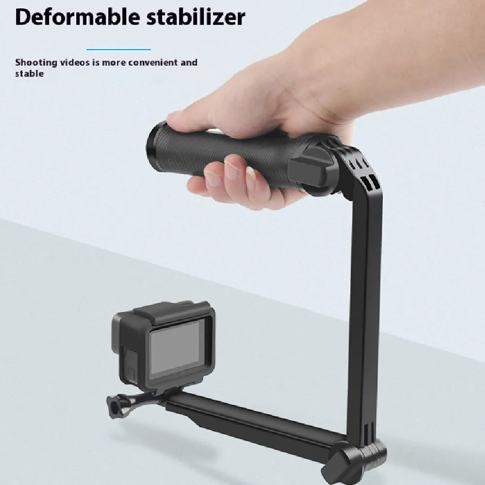 Black portable folding camera tripod stand for GoPro Hero action cameras on a flat surface.