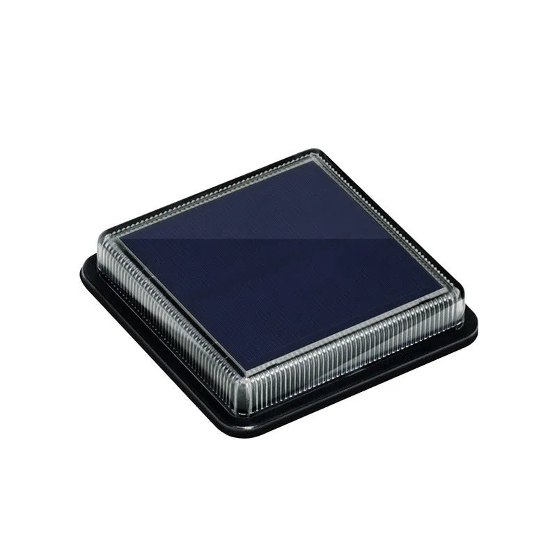 Solar floor tile lamp with aluminium body and glass shade on outdoor staircase for courtyard decoration