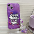 Purple graffiti love design iPhone 14 phone case with an attached silver chain bracelet.