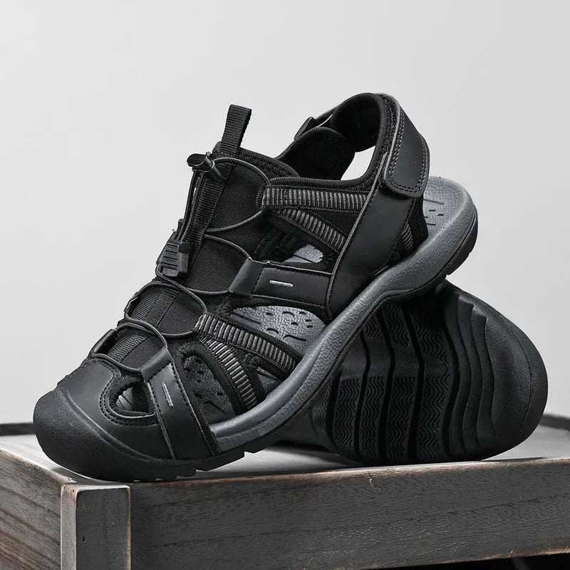 Men's blue and black casual sports shoes with Velcro strap and mesh upper on a rubber sole.