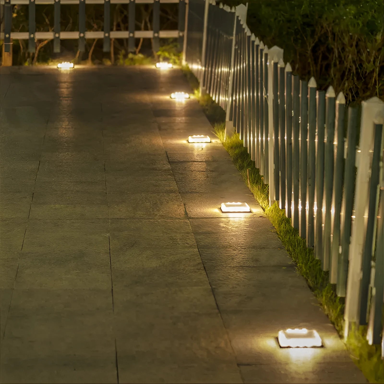 Solar floor tile lamp with aluminium body and glass shade on outdoor staircase for courtyard decoration