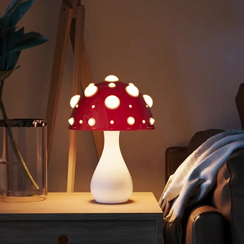 Modern mushroom-shaped table lamp with a touch dimming base on a wooden surface.
