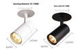 Black recessed cylinder LED spotlight installed in a ceiling track, showing adjustable head.