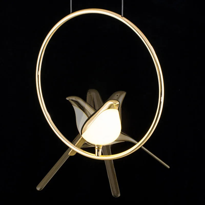 Modern linear chandelier with a minimalist metal magpie bird design and clear acrylic details, hanging 150cm long.