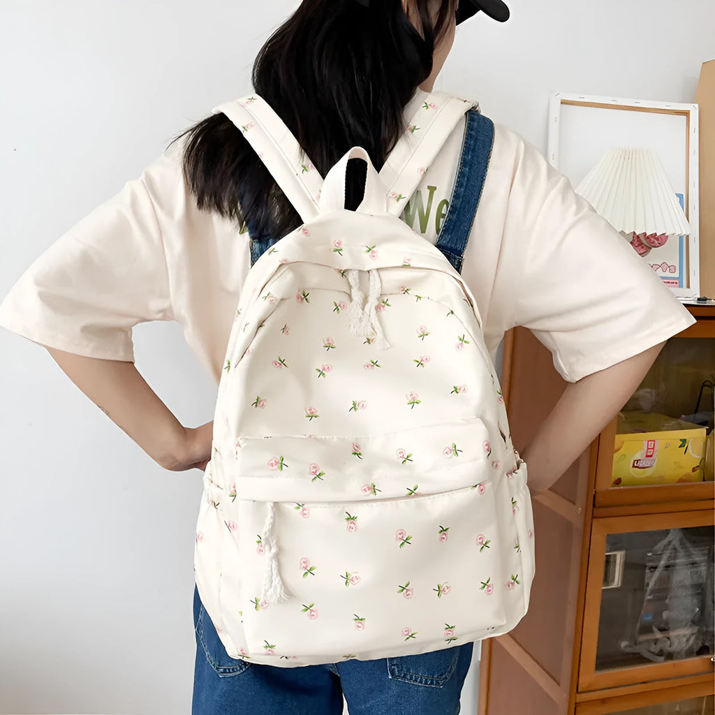 Nylon school backpack with floral pattern in Tulip colour, 20-35L capacity breathable design