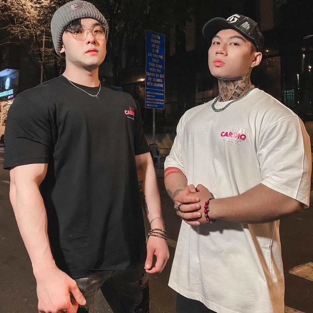 Men's cotton loose fit athletic T-shirt with half sleeves and round collar in black or white, sizes L to 3XL