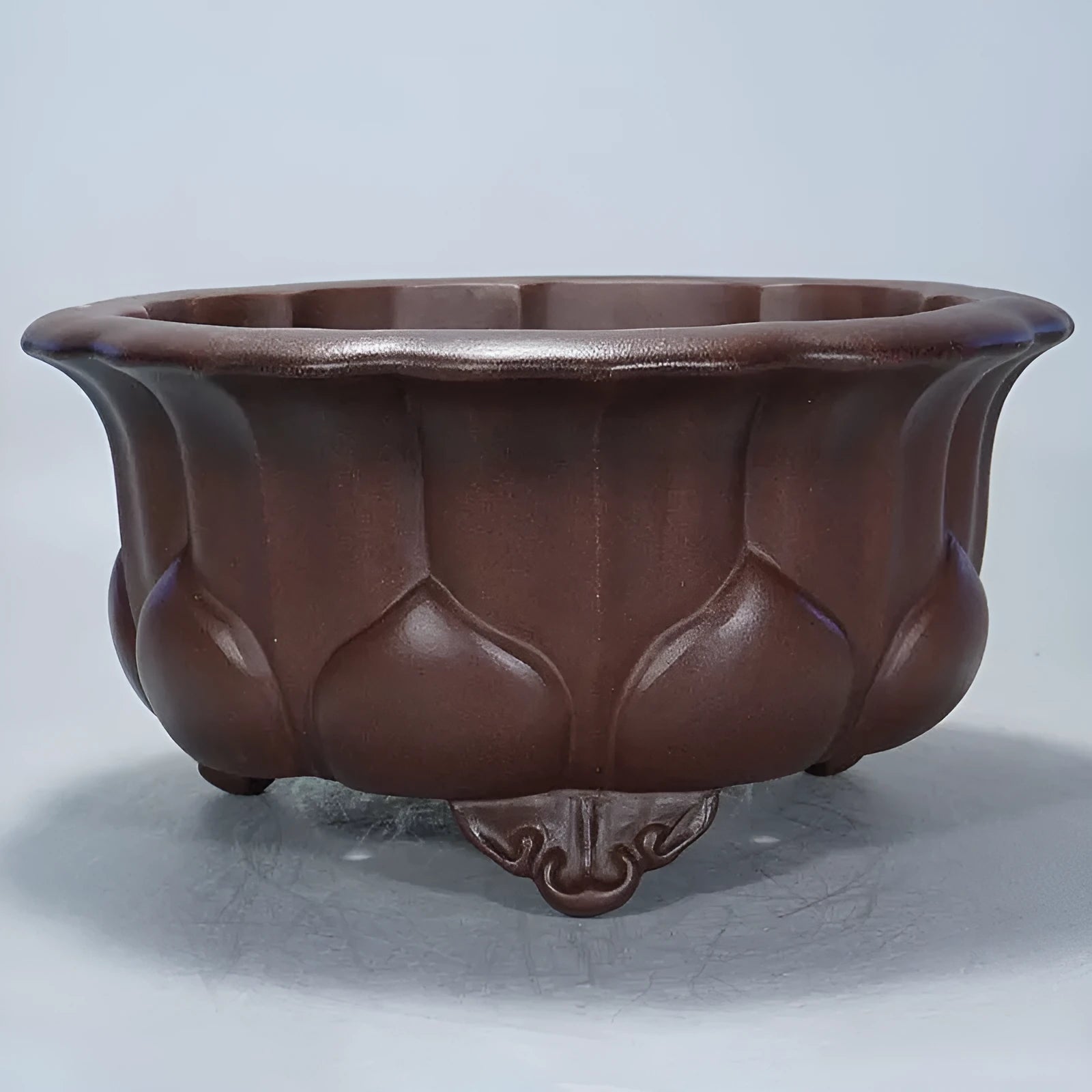 Square purple-red antique Petal Basin flowerpot for bonsai plants on a surface.