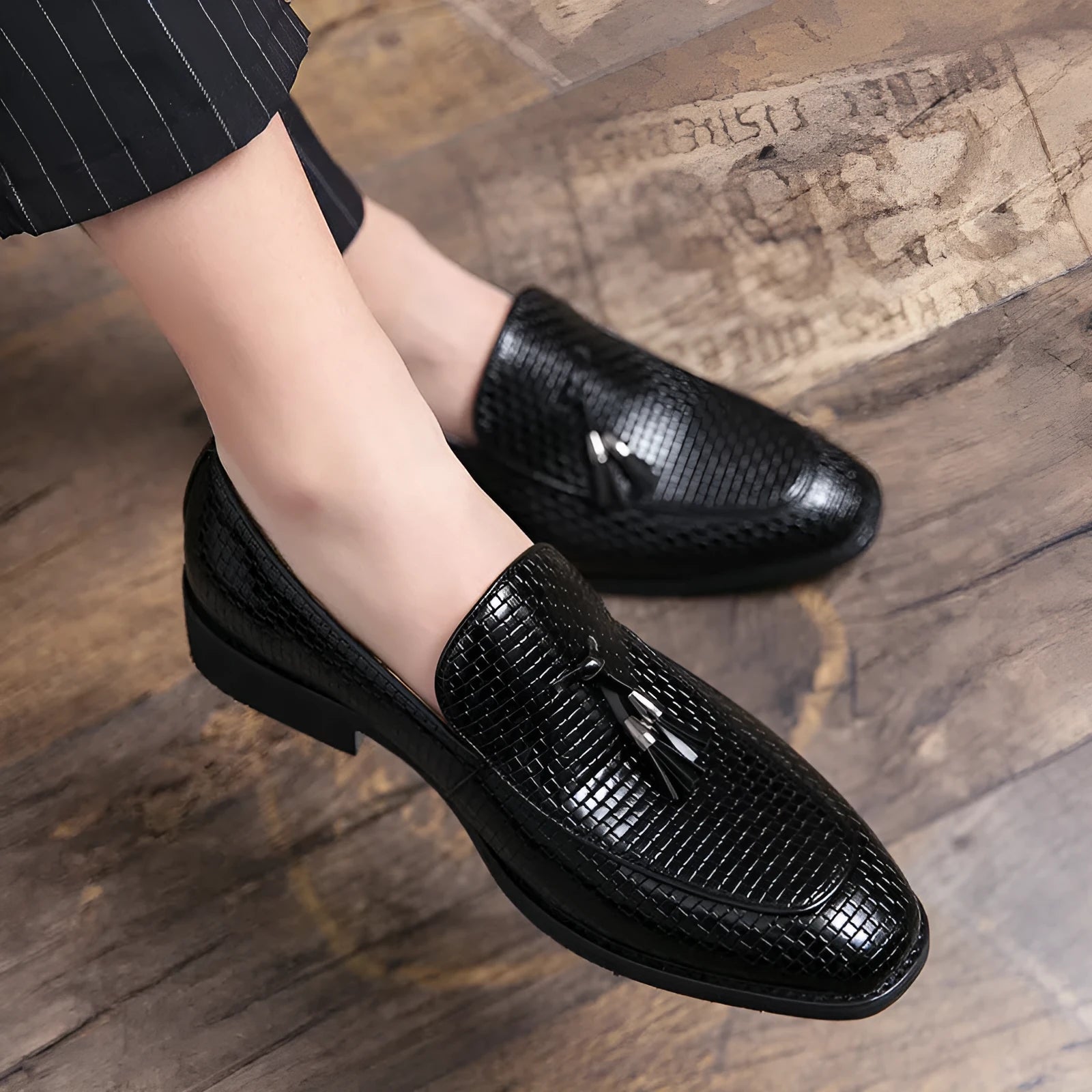 Men's black slip-on loafers with pointed toe and tassel detail, business style artificial PU shoes