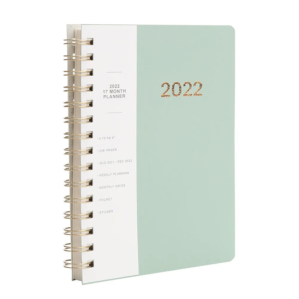 Green and blue 17-month 2022 student planner notebook with coil binding and pockets