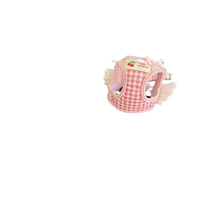 Pink cotton chest and back dog harness with lead for a small dog, size label shown.