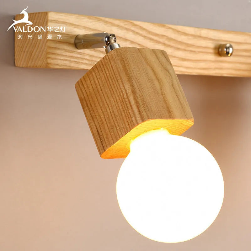 Compact 24cm LED wall lamp with a mirrored cabinet design mounted on a wall.