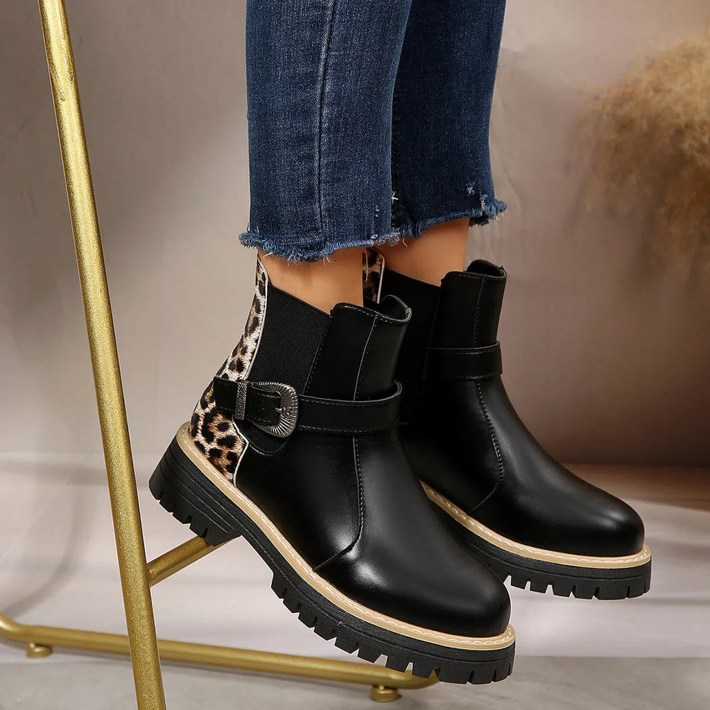 Plus-size women's black leopard print ankle boots with metal buckle, round toe, and mid-heel