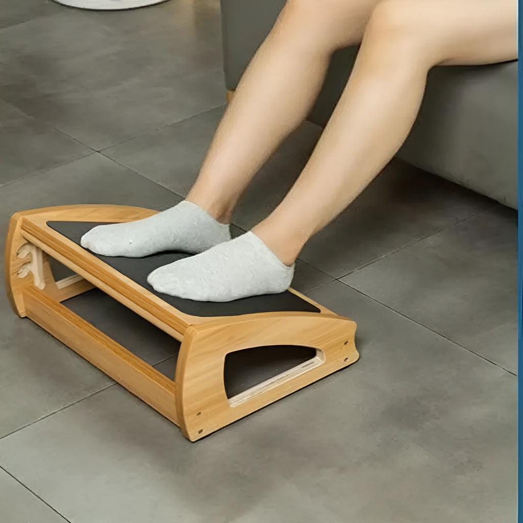 Wood-colour adjustable bamboo office desk footstool in a modern simplicity design.