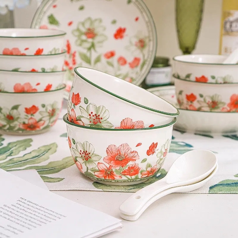 Ceramic tableware gift box set with 4 bowls, 4 spoons, and 2 plates in matching underglaze finish
