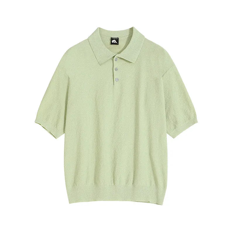 Men's caramel coloured retro knitted polo shirt with short sleeves and an asymmetrical design laid flat.