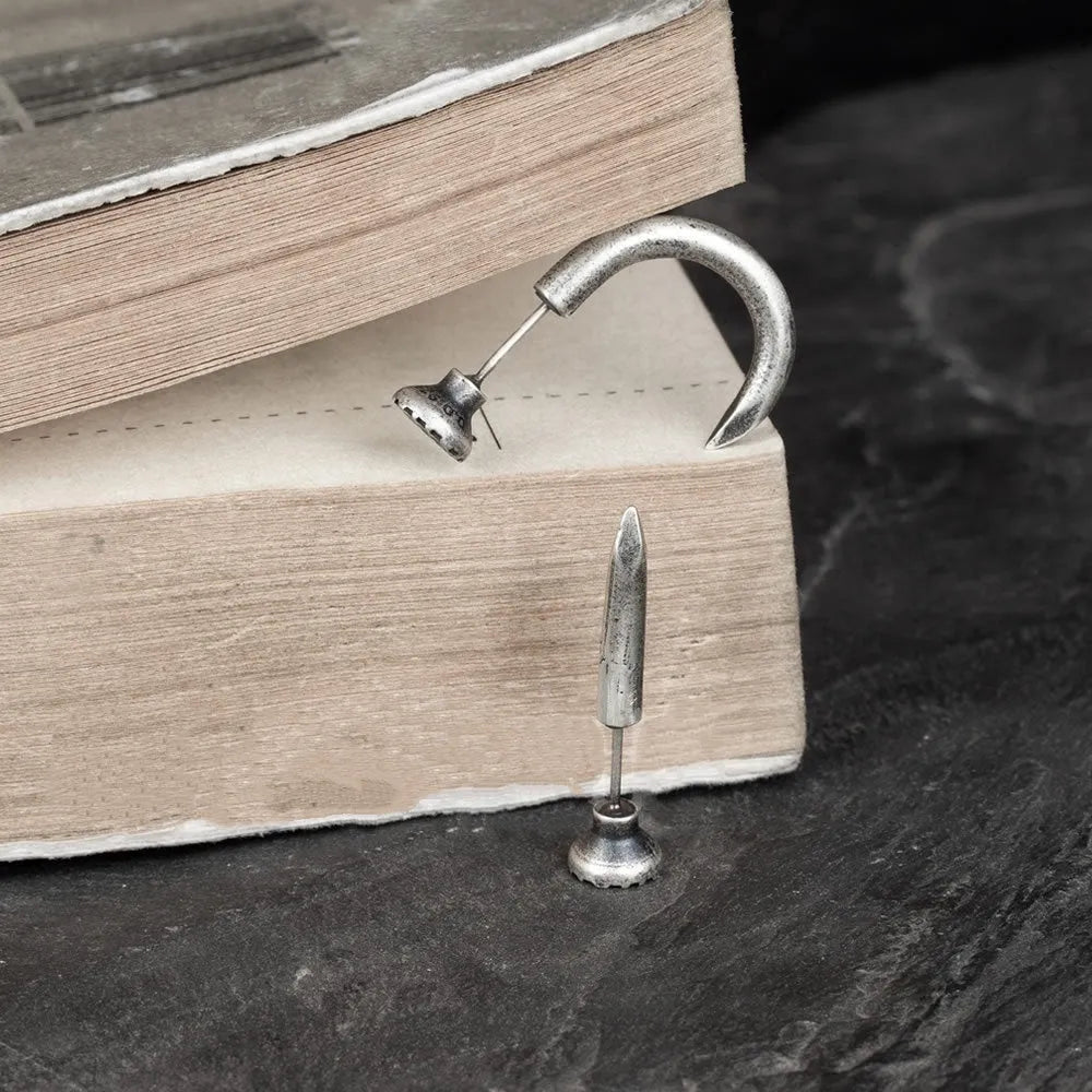 S925 sterling silver nail earrings in straight and curved punk stud designs with ear hook closures