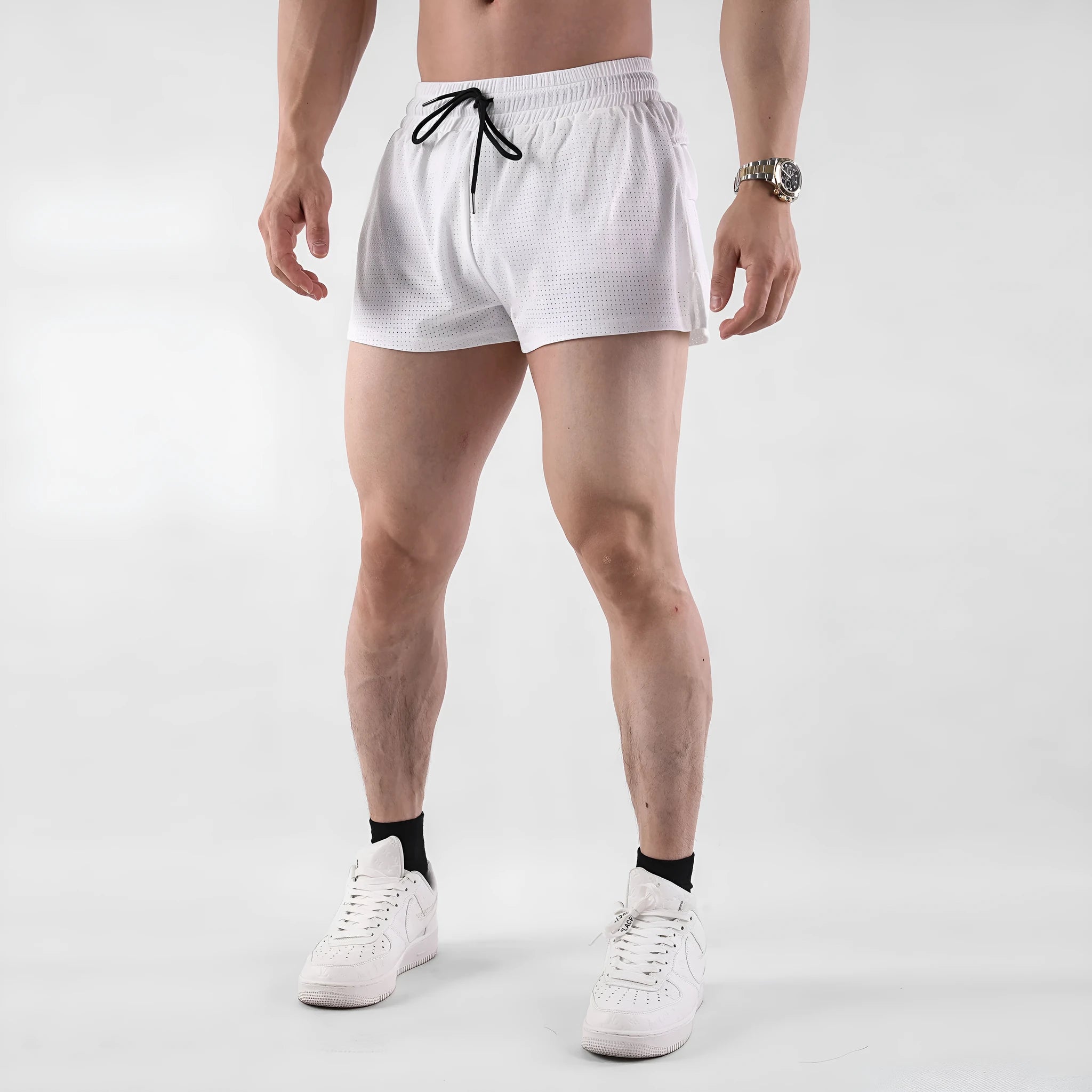 Men's white and black quick-drying nylon shorts for summer sports.