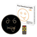 Black car rear window LED expression light showing smiley face pattern with orange LED beads