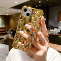 iPhone case with attached luxury diamond bracelet chain in silver or gold colour with flash diamond lock