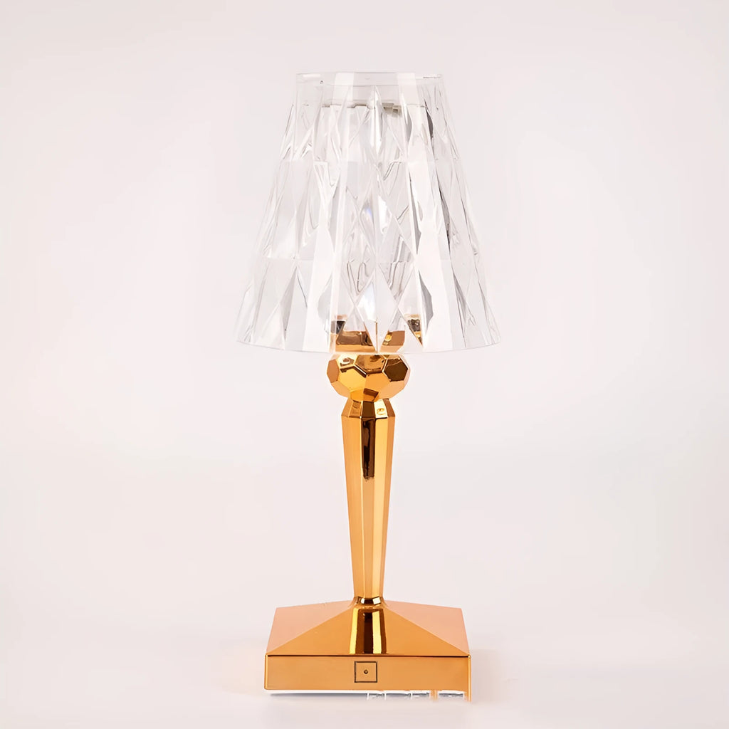 Rose gold portable touch control night light with rechargeable battery on a surface