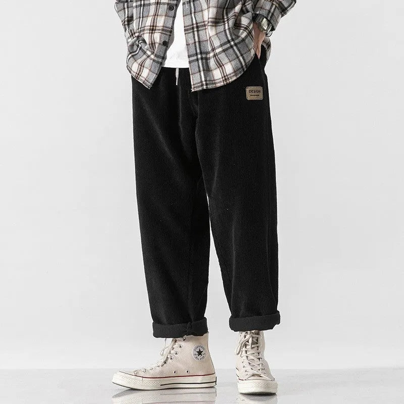 Men's loose straight corduroy sports trousers in Army Green colour with mid-waist design