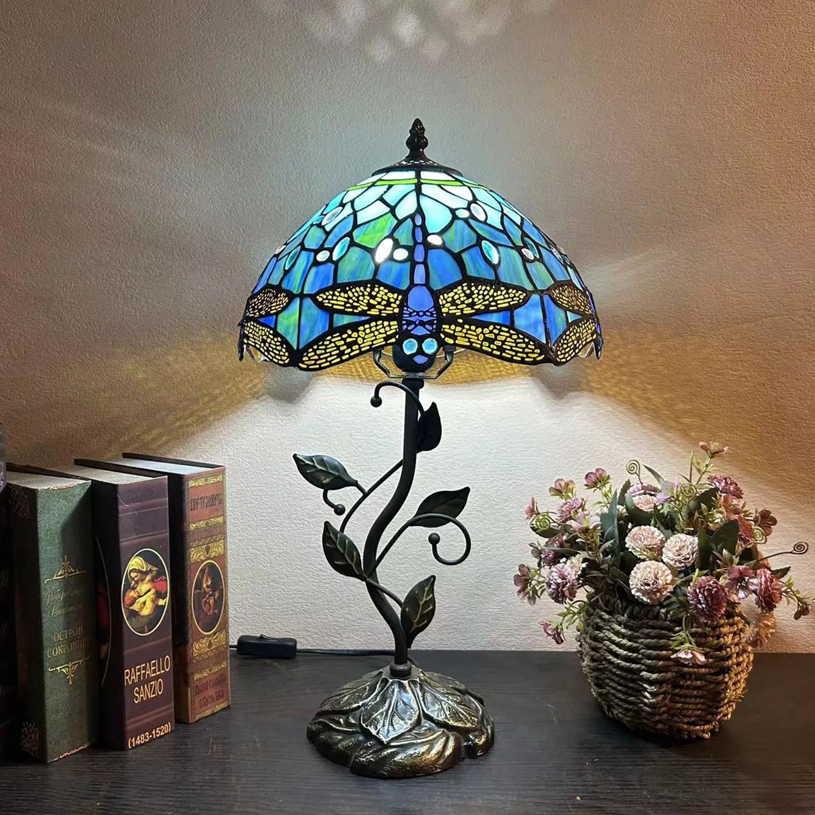 American Pastoral Tiffany 12-inch table lamp with coloured glass shade and resin base, 30 cm wide