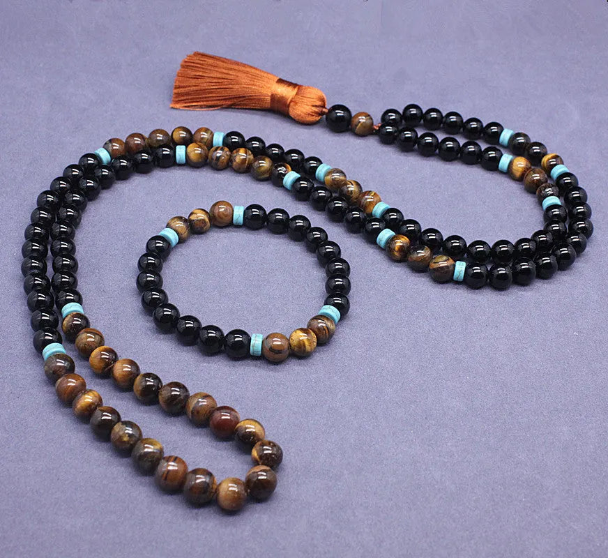 Black agate bracelet and matching necklace with a Tiger pattern stone pendant.
