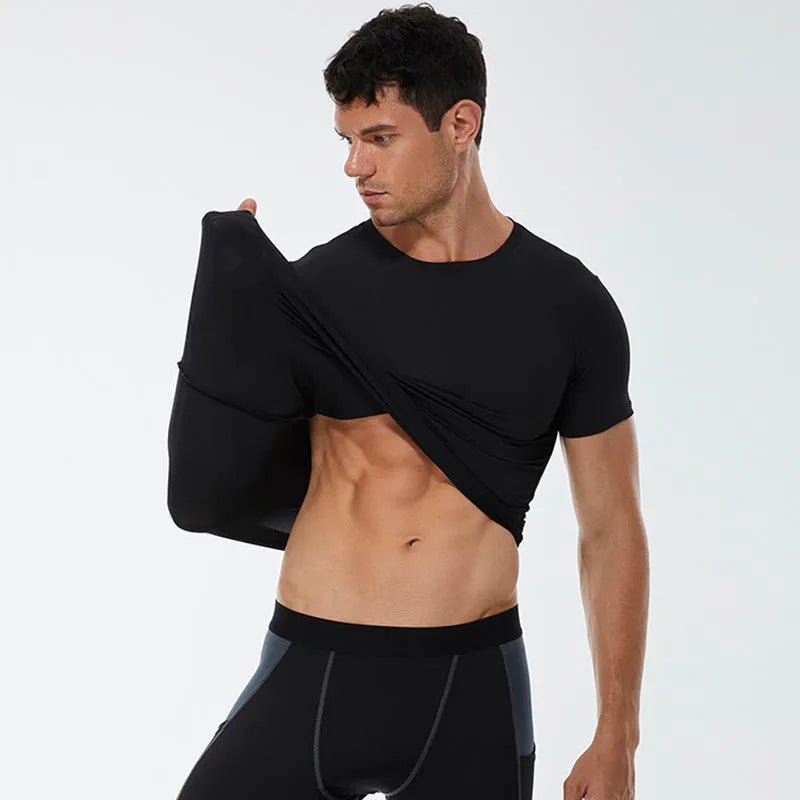 Men's solid colour quick drying short-sleeved fitness shirt in polyester fabric with stretch construction