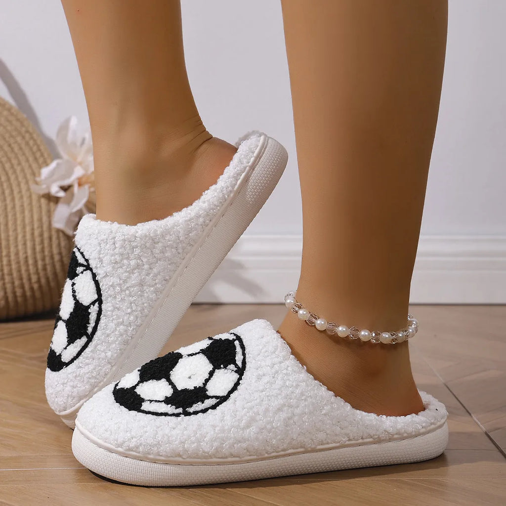 White thermal cotton slippers with ethnic totem pattern, plush upper, and TPR sole on a floor