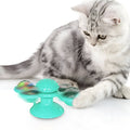 Windmill cat toy with suction cup, rotating spinner, LED ball, and catnip balls for indoor cats