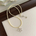 Women's colourful beaded hollow flower necklace with U-shaped pendant on electroplated copper chain