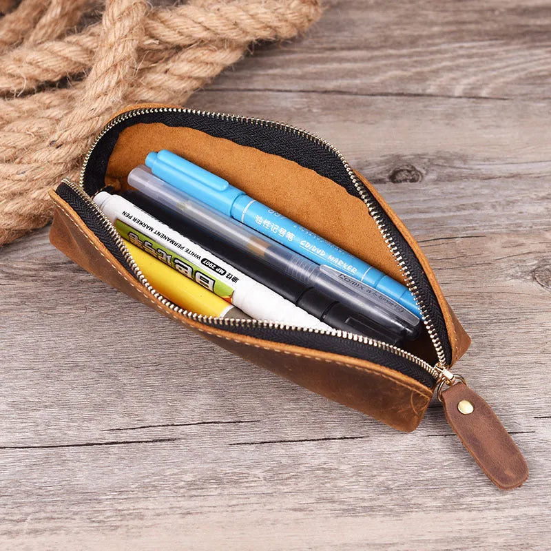 Square handmade genuine cowhide leather pencil case with zipper in black, brown, dark brown, or yellow.