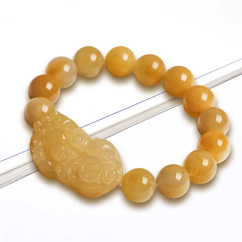 Carved Jinsi Jade Money Bracelet showing golden thread patterning, displayed in large and small size options.